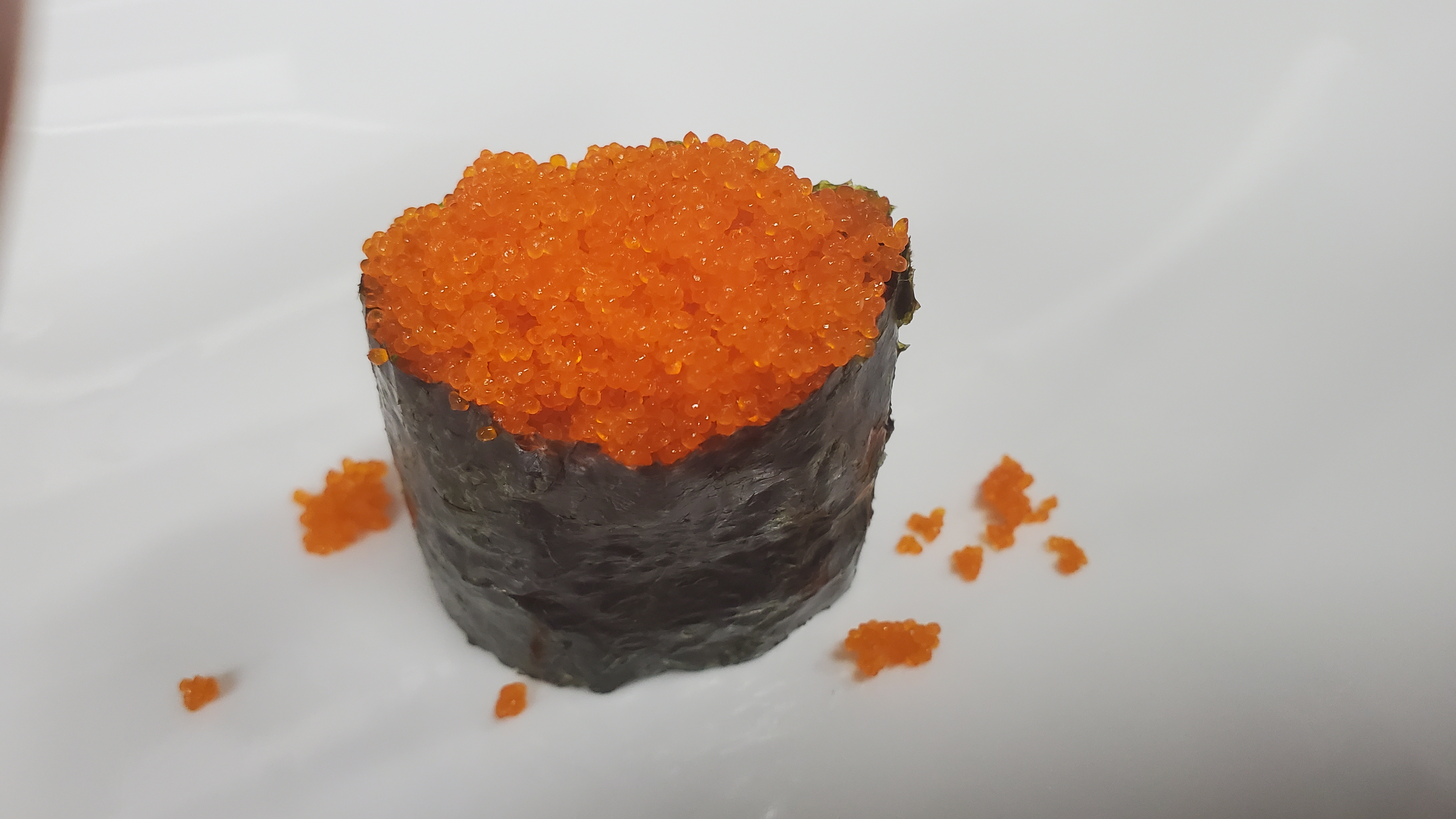 Order Smelt Egg Sushi (3pcs) food online from Sushi Loco store, Long Beach on bringmethat.com