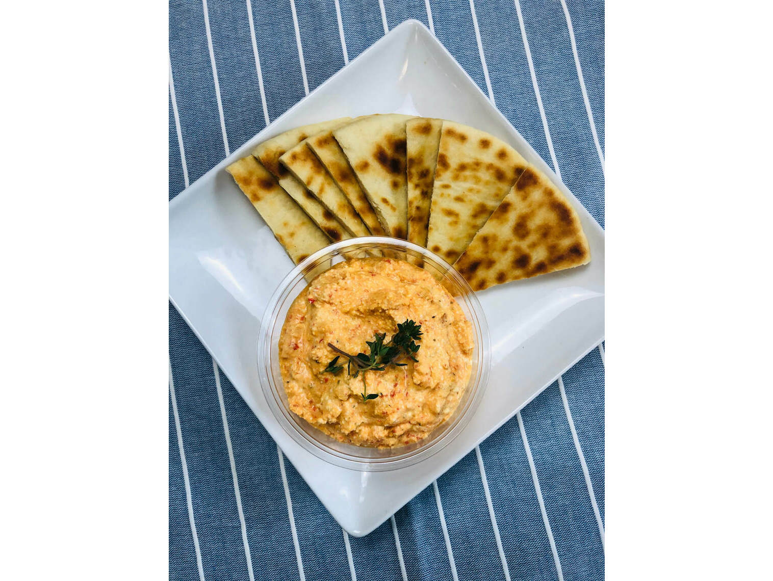 Order Pita and Roasted Red Pepper Dip - D food online from The Counter At Old Ballard Catering Co. store, Seattle on bringmethat.com