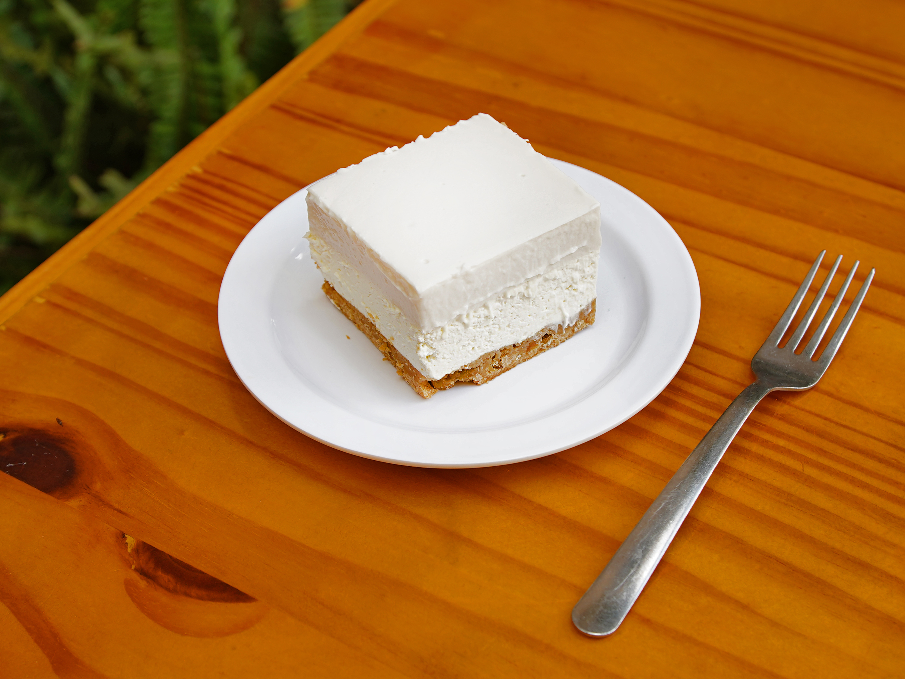 Order Coconut Haupia Cheesecake Slice food online from Back Home in Lahaina store, Carson on bringmethat.com