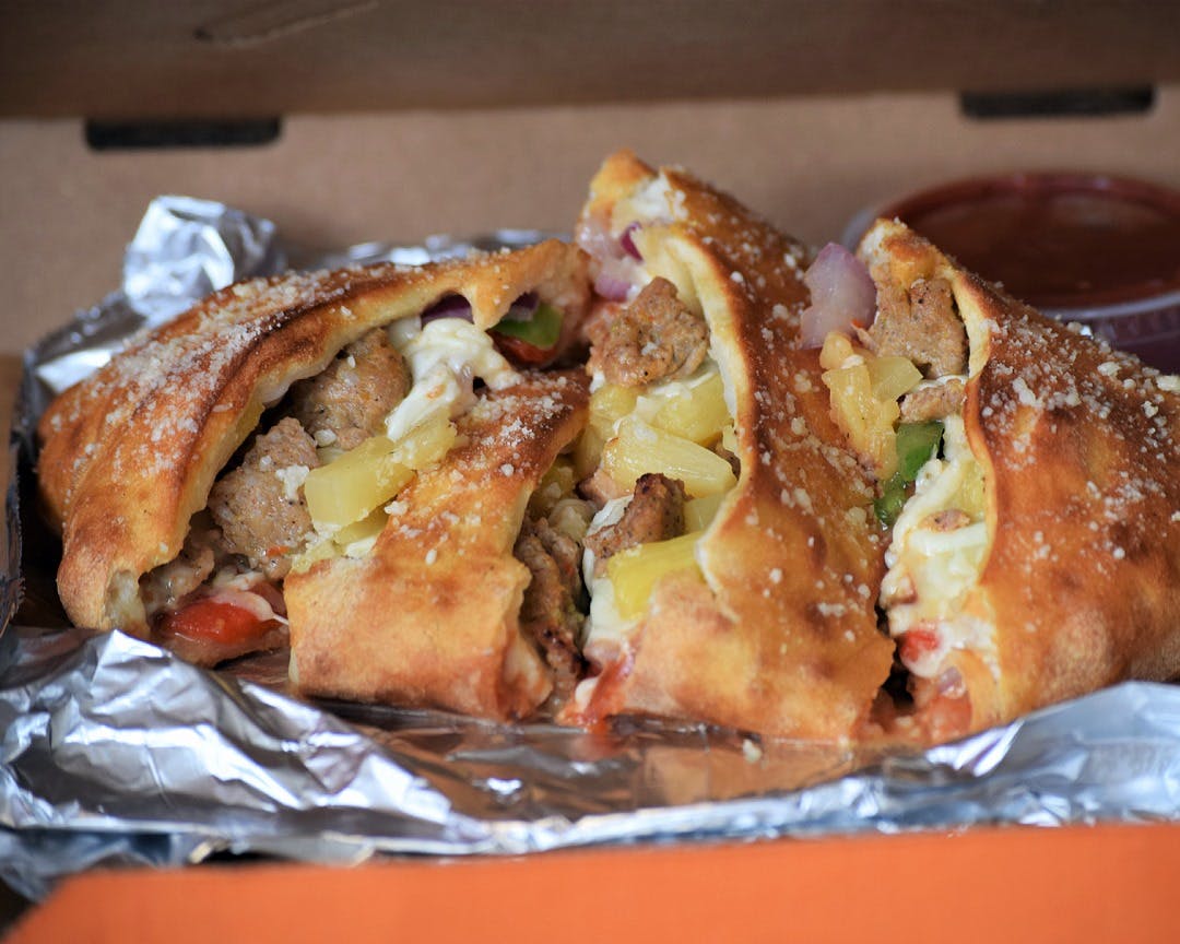 Order Oven Fresh Calzone - Small food online from Cottage Inn Pizza store, Dexter on bringmethat.com