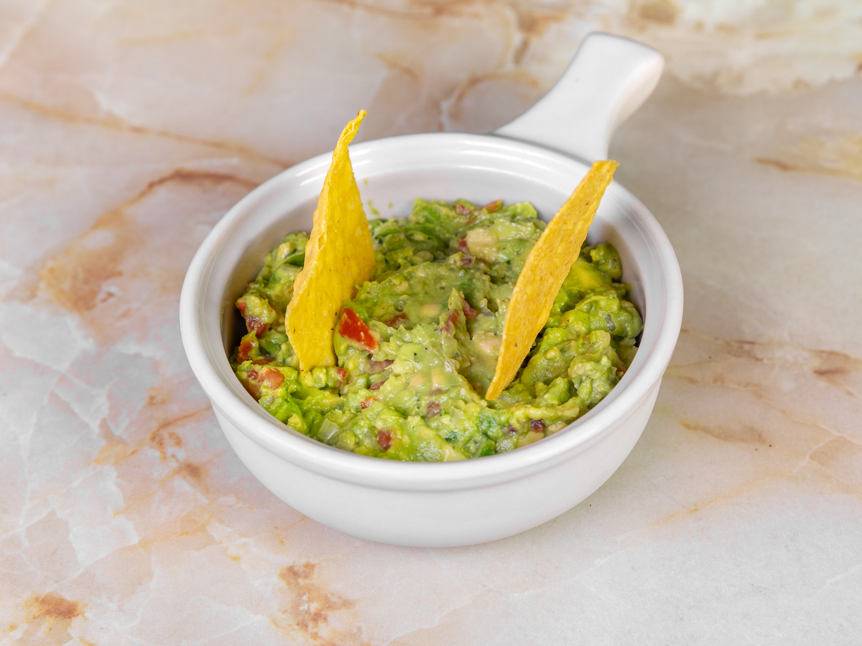 Order Guacamole and Chips food online from Oasis Mexican Grill store, Springdale on bringmethat.com
