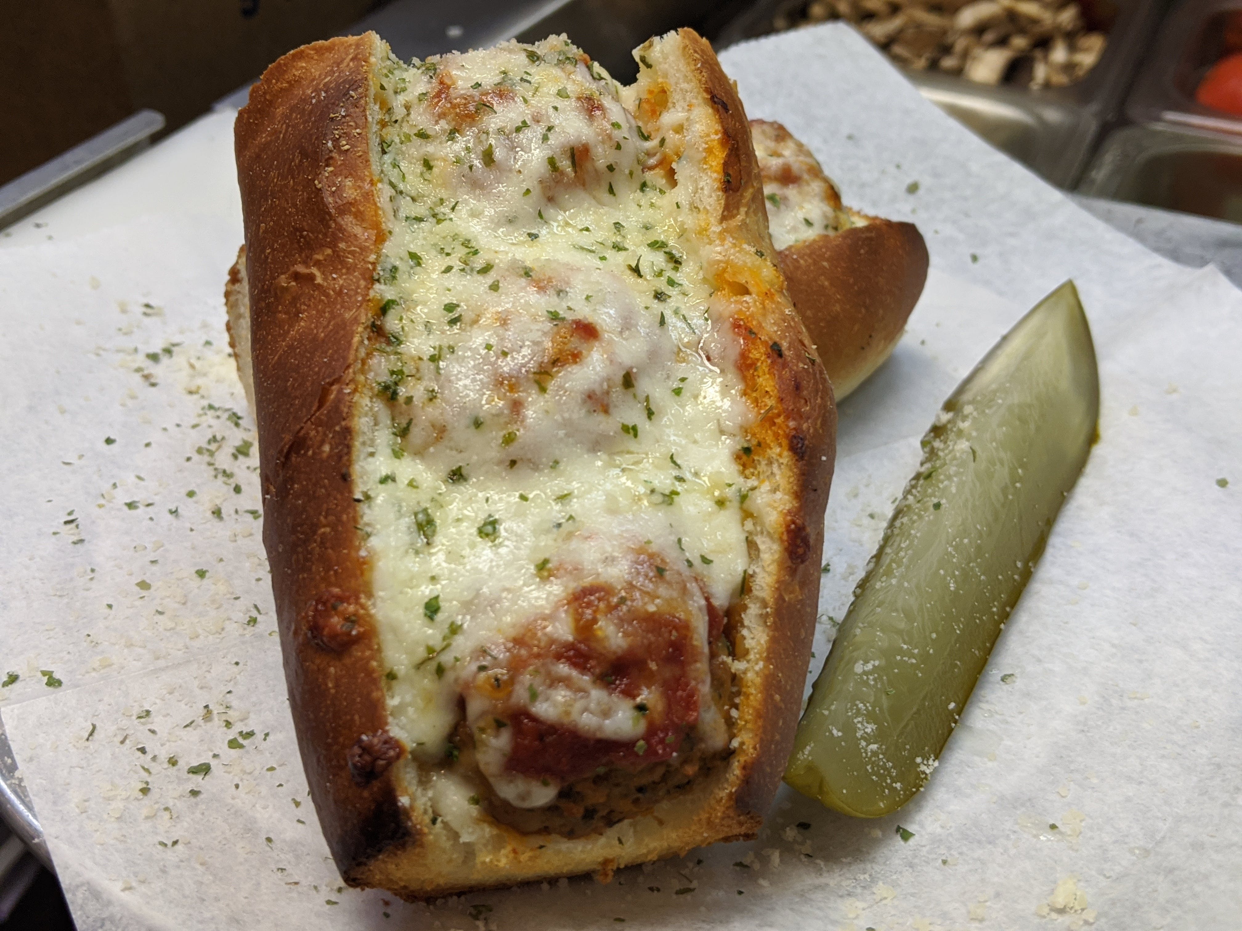 Order Meatball Parmigiana - Sandwich food online from Lucino Pizza store, Las Vegas on bringmethat.com