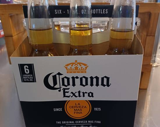 Order Corona Extra 6 pk 12 oz bottles (4.6% ABV) food online from Colbert Trading Co store, Colbert on bringmethat.com