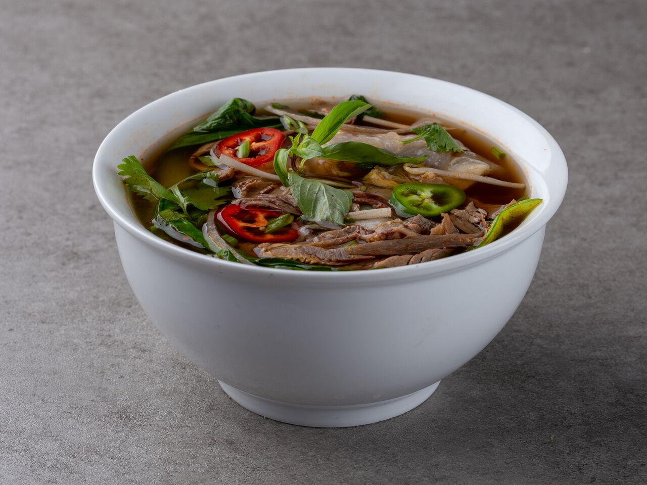 Order Spicy Pho food online from Mignon Pho + Grill store, San Diego on bringmethat.com