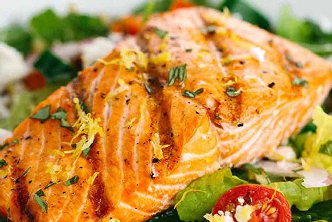 Order Salmon over Salad food online from It's Greek to Us store, Marietta on bringmethat.com