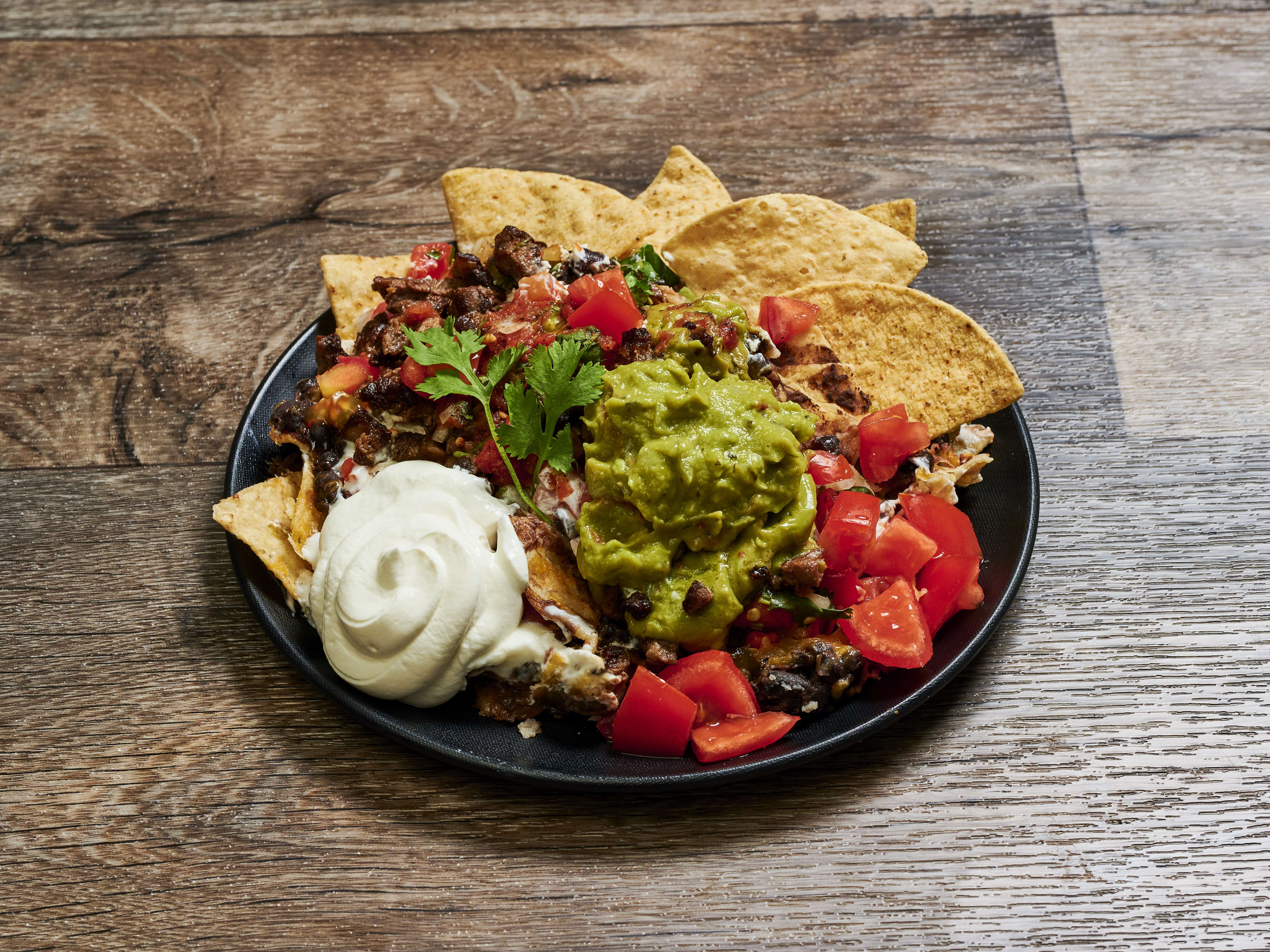 Order Steak Nachos food online from Blue Water Taco Grill store, Seattle on bringmethat.com