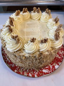 Order Carrot Cake (Slice)(Contains Walnuts) food online from Foster Market store, Durham on bringmethat.com