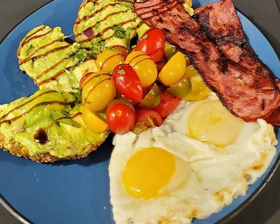 Order AVOCADO TOAST W/ EGGS & TURKEY BACON food online from Food For Thought store, Garden City on bringmethat.com