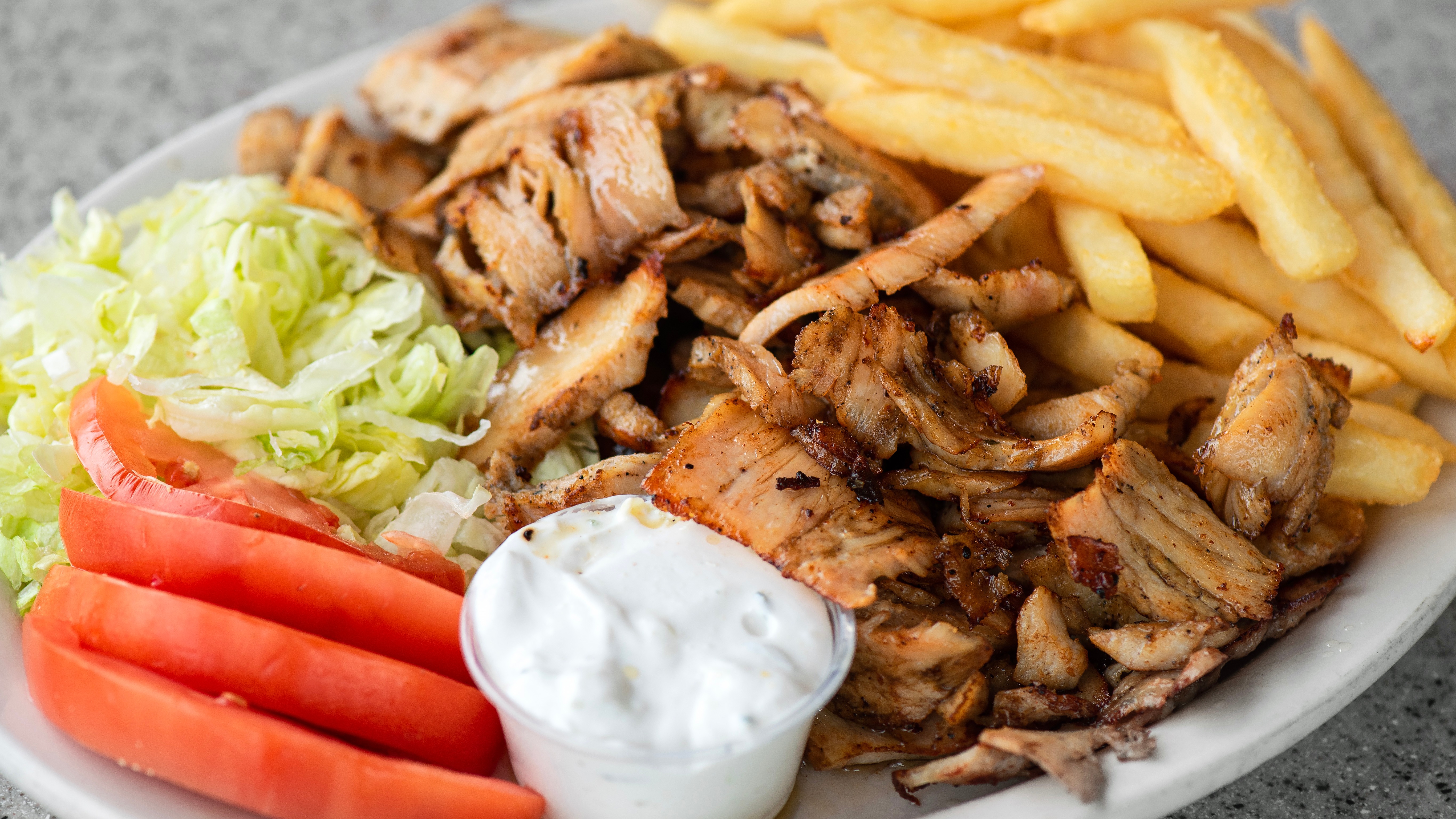 Order Chicken Gyros Plate (Shawerma) food online from Hub's store, Chicago on bringmethat.com