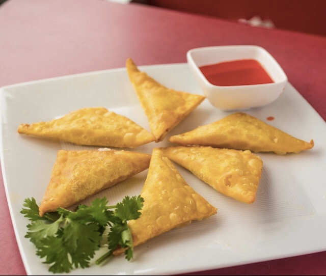 Order 6. Fried Crab Rangoon food online from Empire express chinese restaurant store, Brooklyn on bringmethat.com