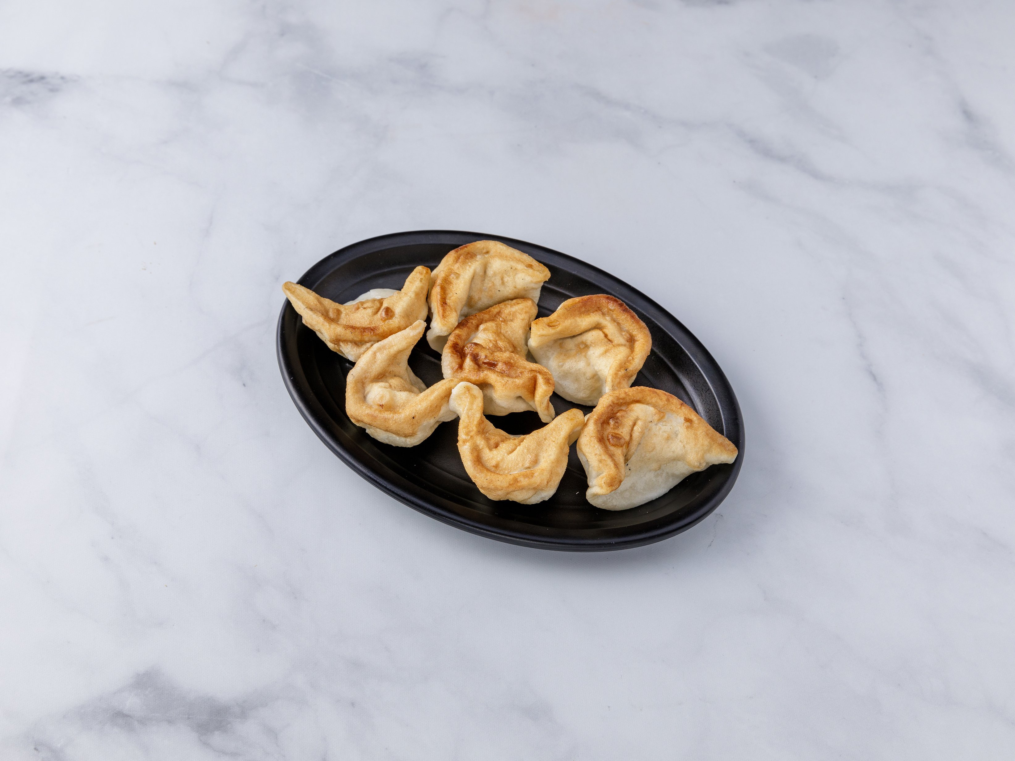 Order Dumplings (7 pieces) food online from Lucky Star store, Bronx on bringmethat.com