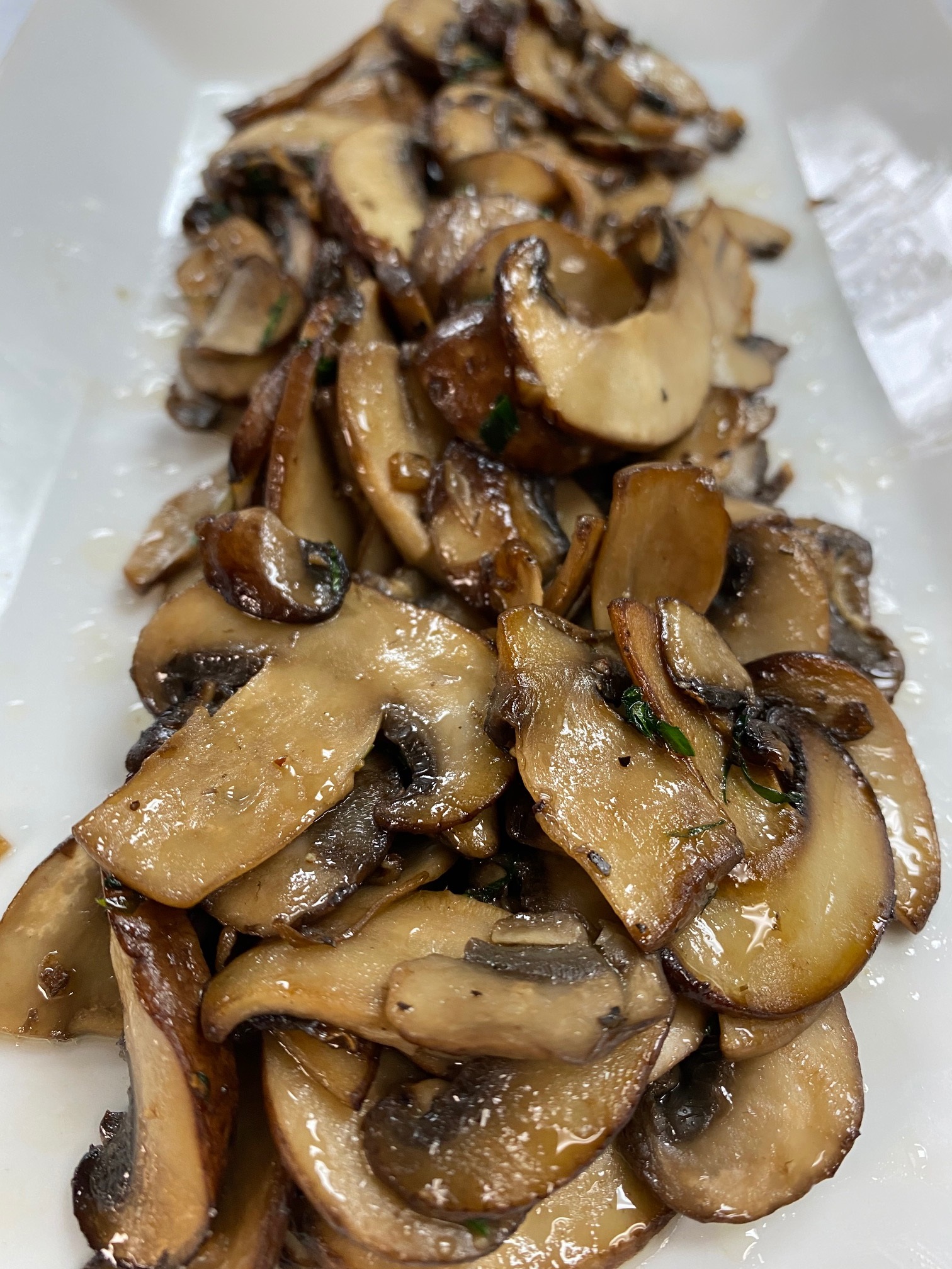 Order Sautéed mix mushrooms food online from IL Baretto To Go store, New York on bringmethat.com