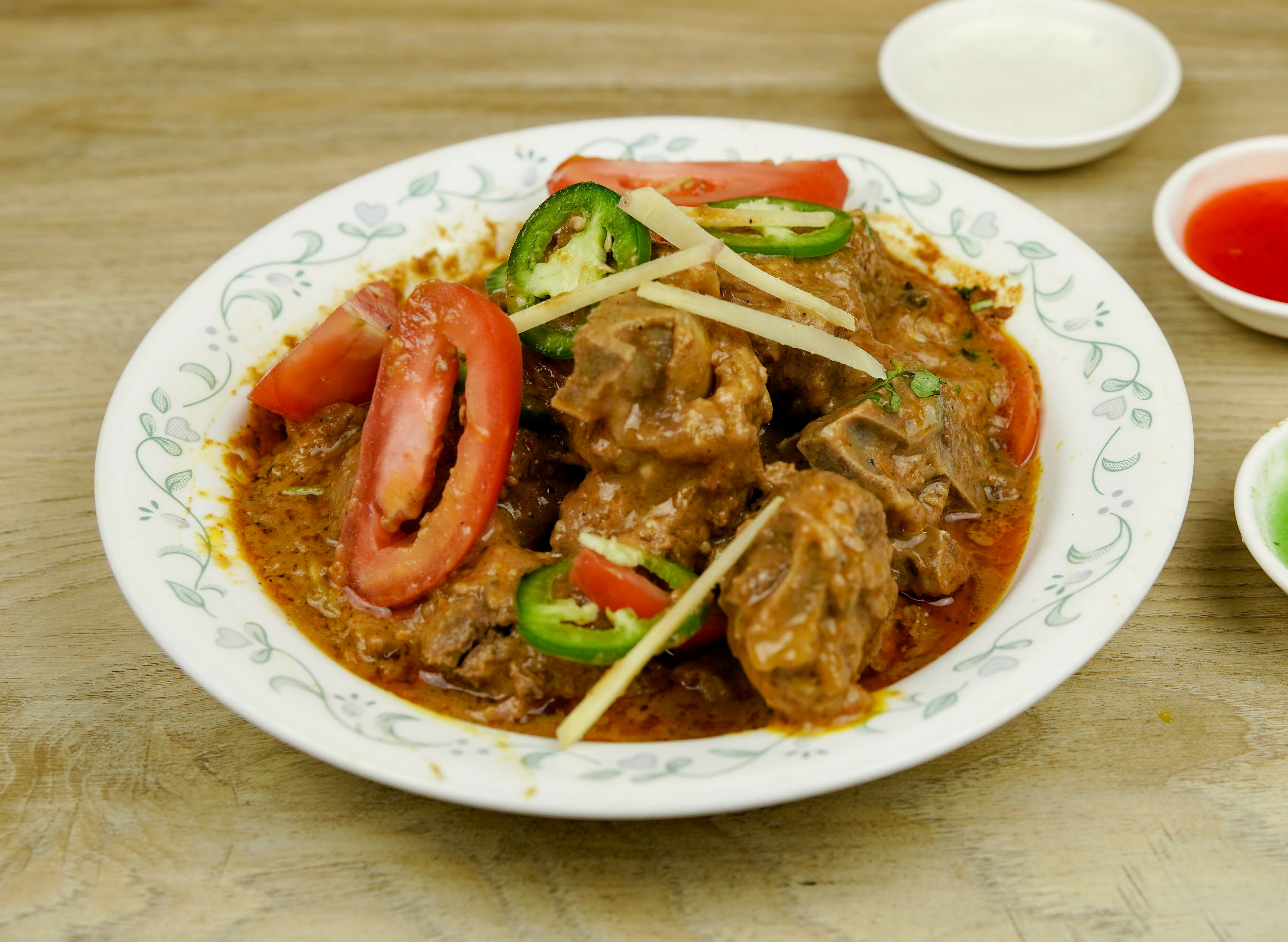 Order Goat Karahi food online from Phayul Restaurant store, Queens on bringmethat.com