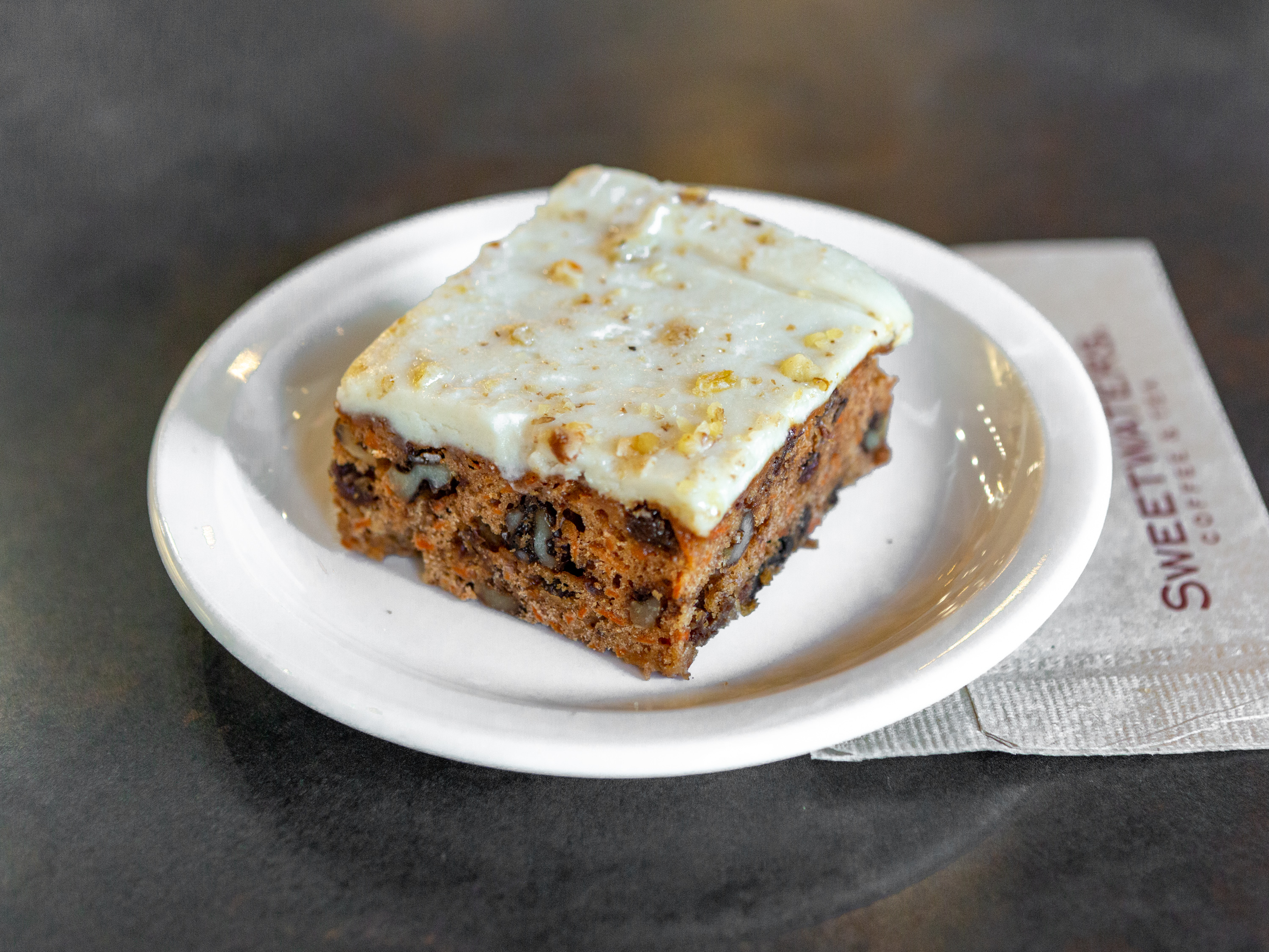 Order Carrot Cake food online from Sweetwaters Coffee & Tea store, Ann Arbor on bringmethat.com