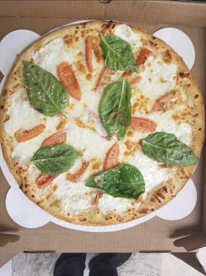 Order White Pizza - Personal 10" food online from Mario Pizza store, Washington on bringmethat.com