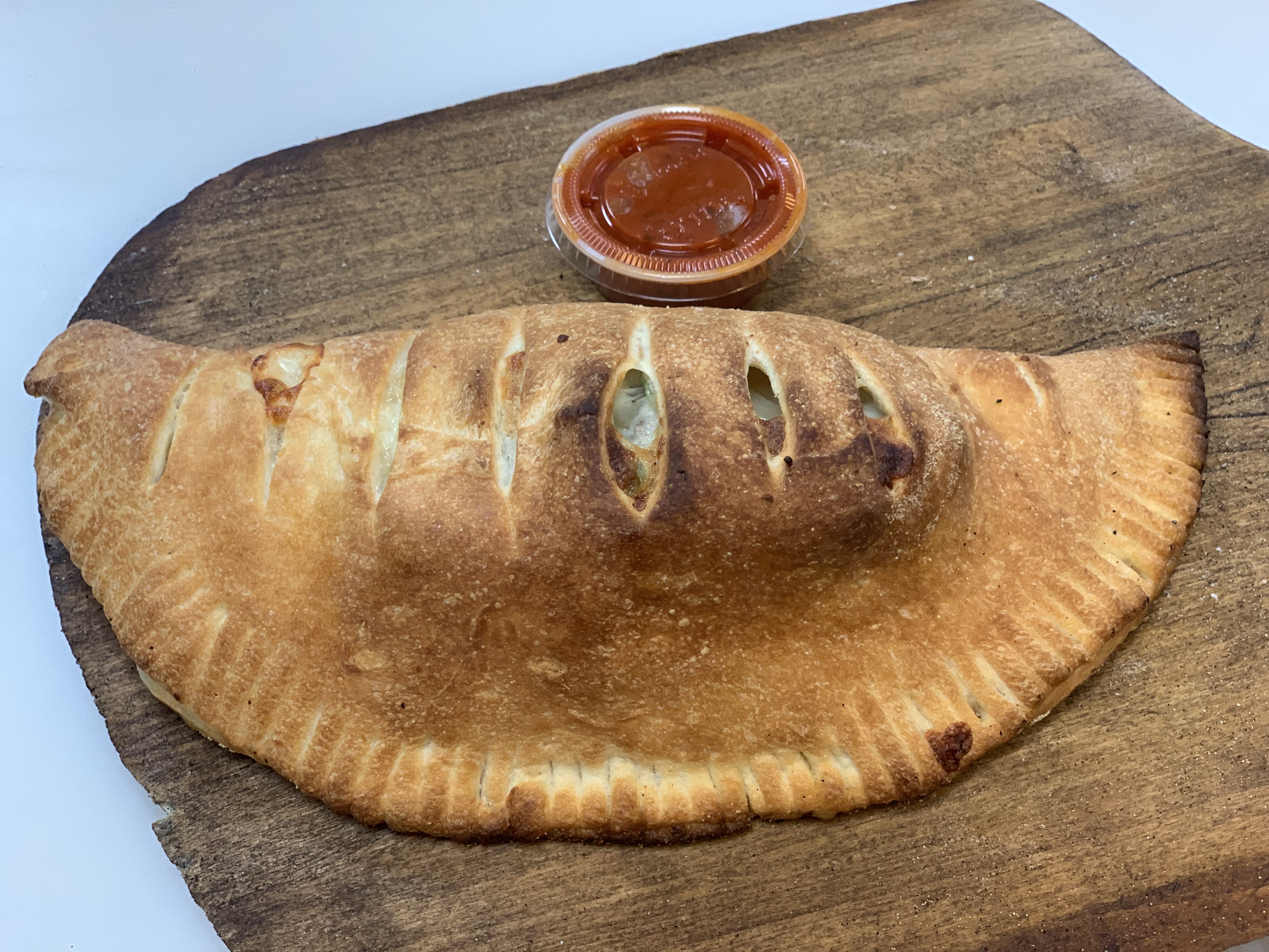 Order Build Your Own Calzone food online from 204 Pizza store, Virginia Beach on bringmethat.com