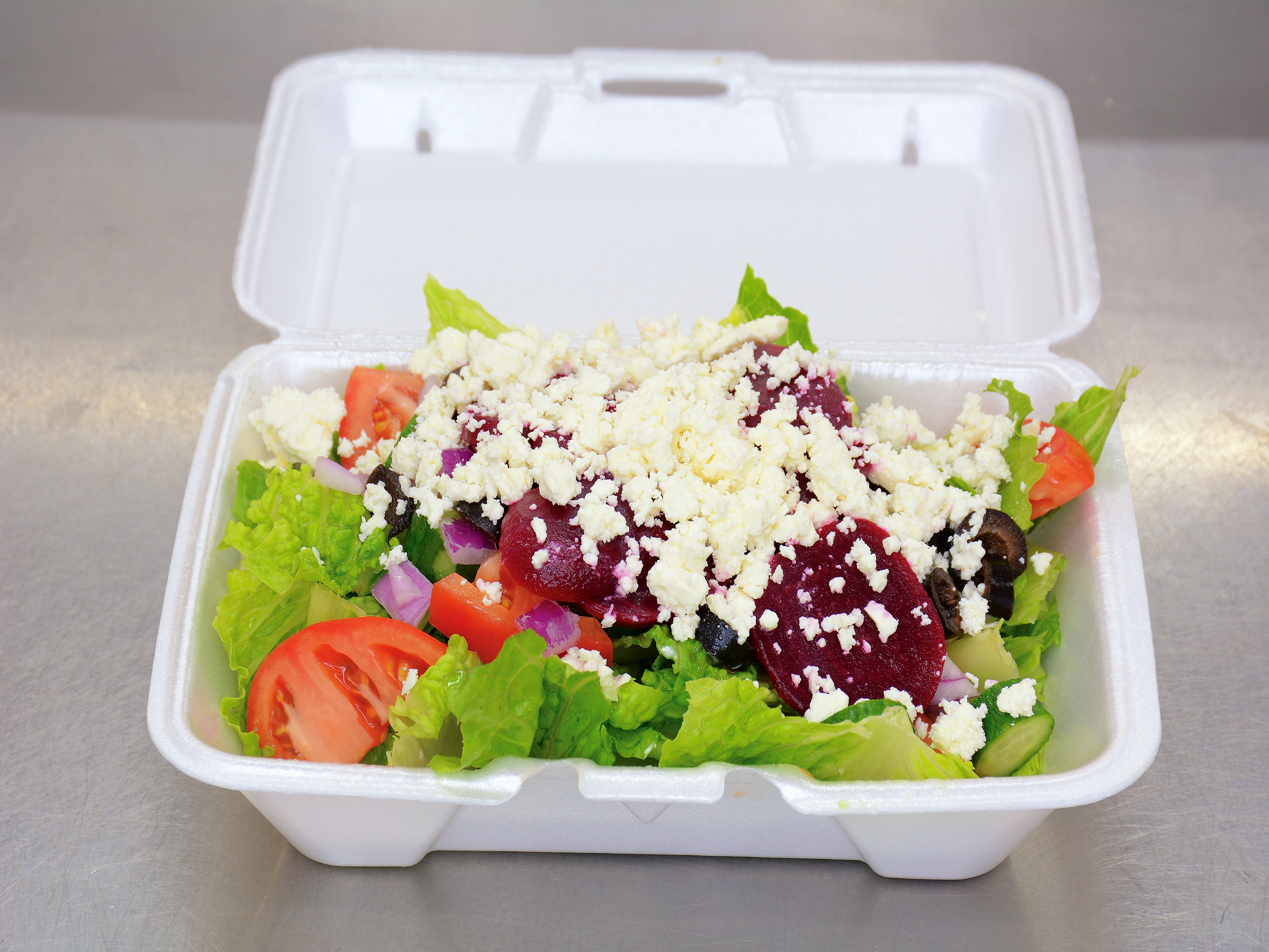 Order Greek Salad food online from Ultimate Pizza store, Howell on bringmethat.com