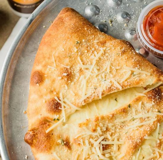 Order Large Cheese Calzone food online from Palio's Pizza Cafe - Midland TX store, Midland on bringmethat.com