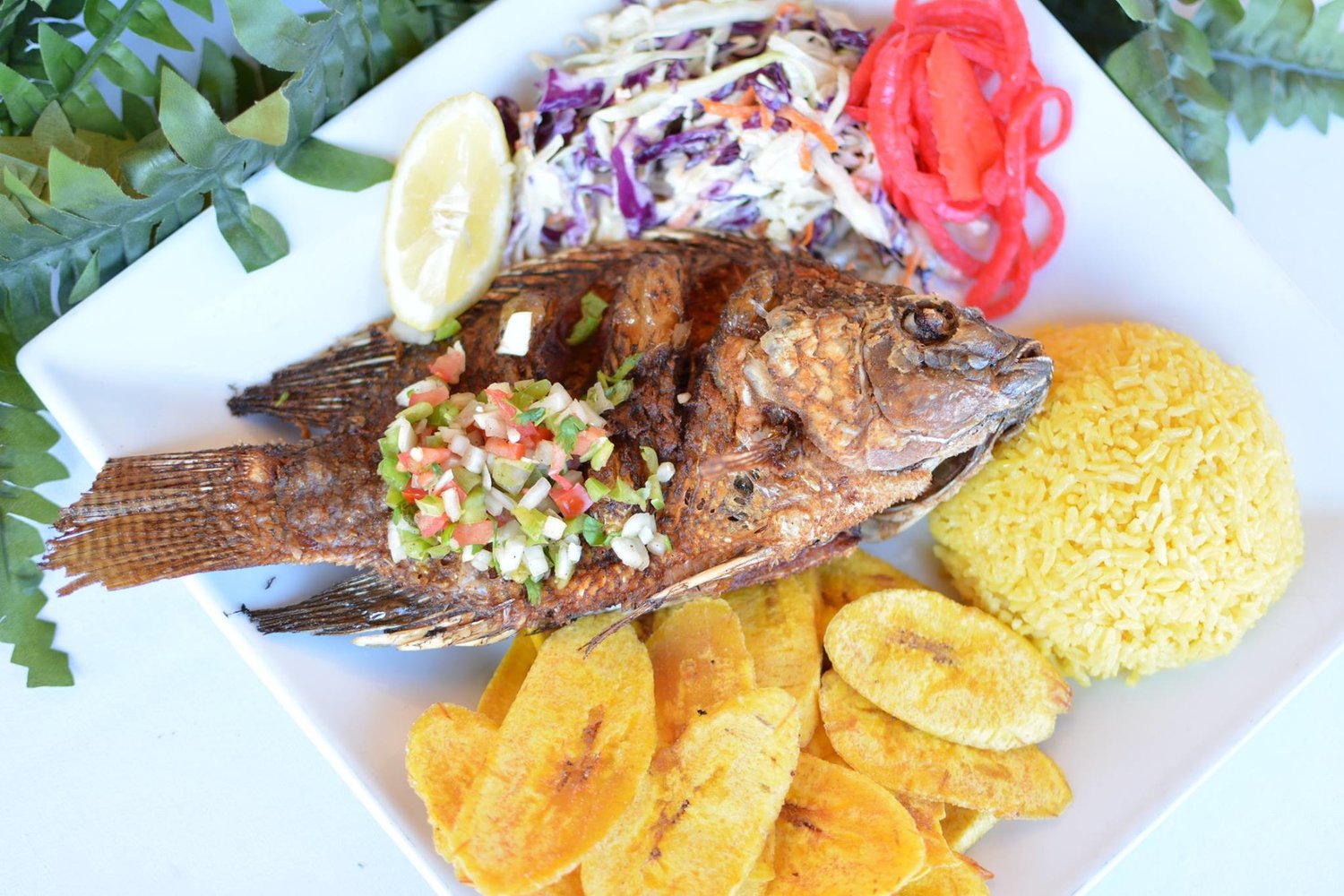 Order Pescado Frito food online from Honduran Kitchen store, Mobile on bringmethat.com