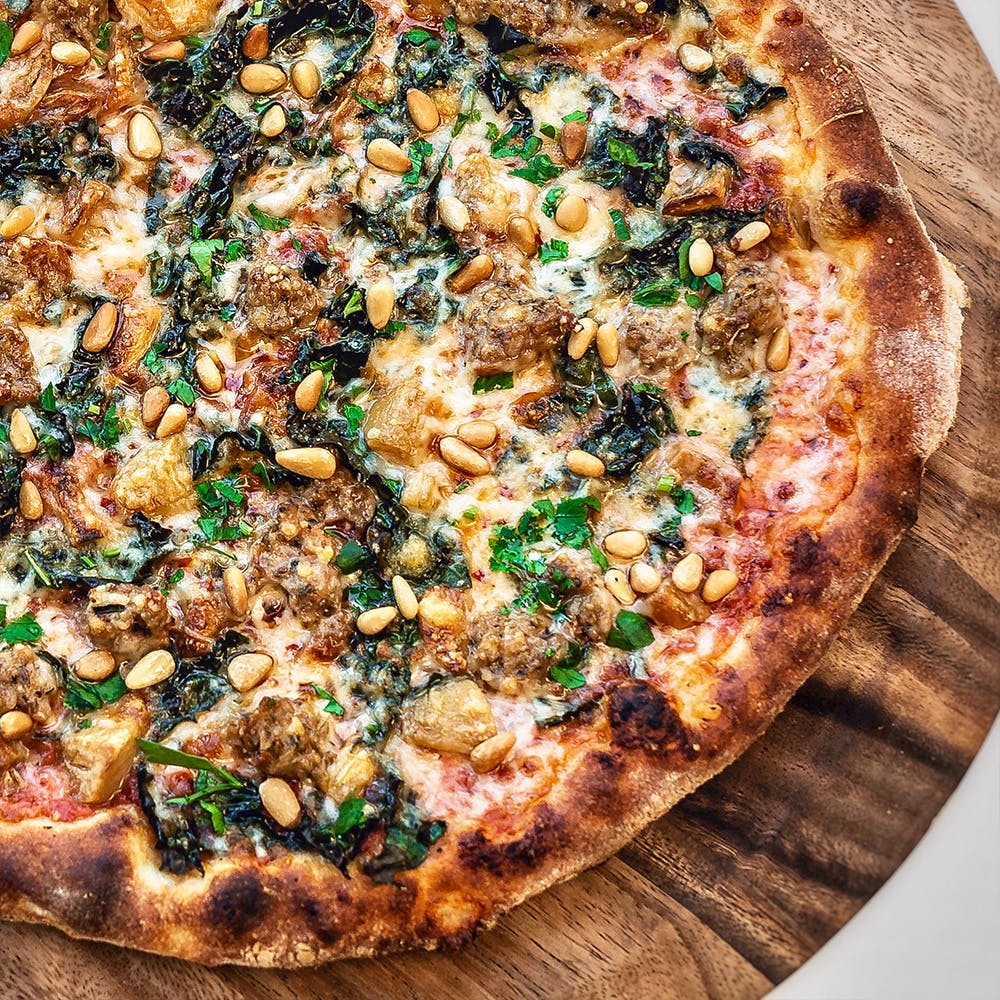 Order Kale & Sausage Pizza - Mini 7'' (Serves 1 Person) food online from Amici's East Coast Pizzeria store, Redwood Shores on bringmethat.com