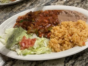 Order 43. Asada Entomatada (Bistec Ranchero) food online from Mi Rancho store, San Antonio on bringmethat.com