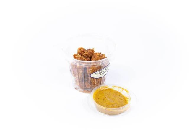 Order Pretzel Chicken Nuggets With Honey Mustard Sauce food online from Fialkoff Kosher Pizza store, Lawrence on bringmethat.com