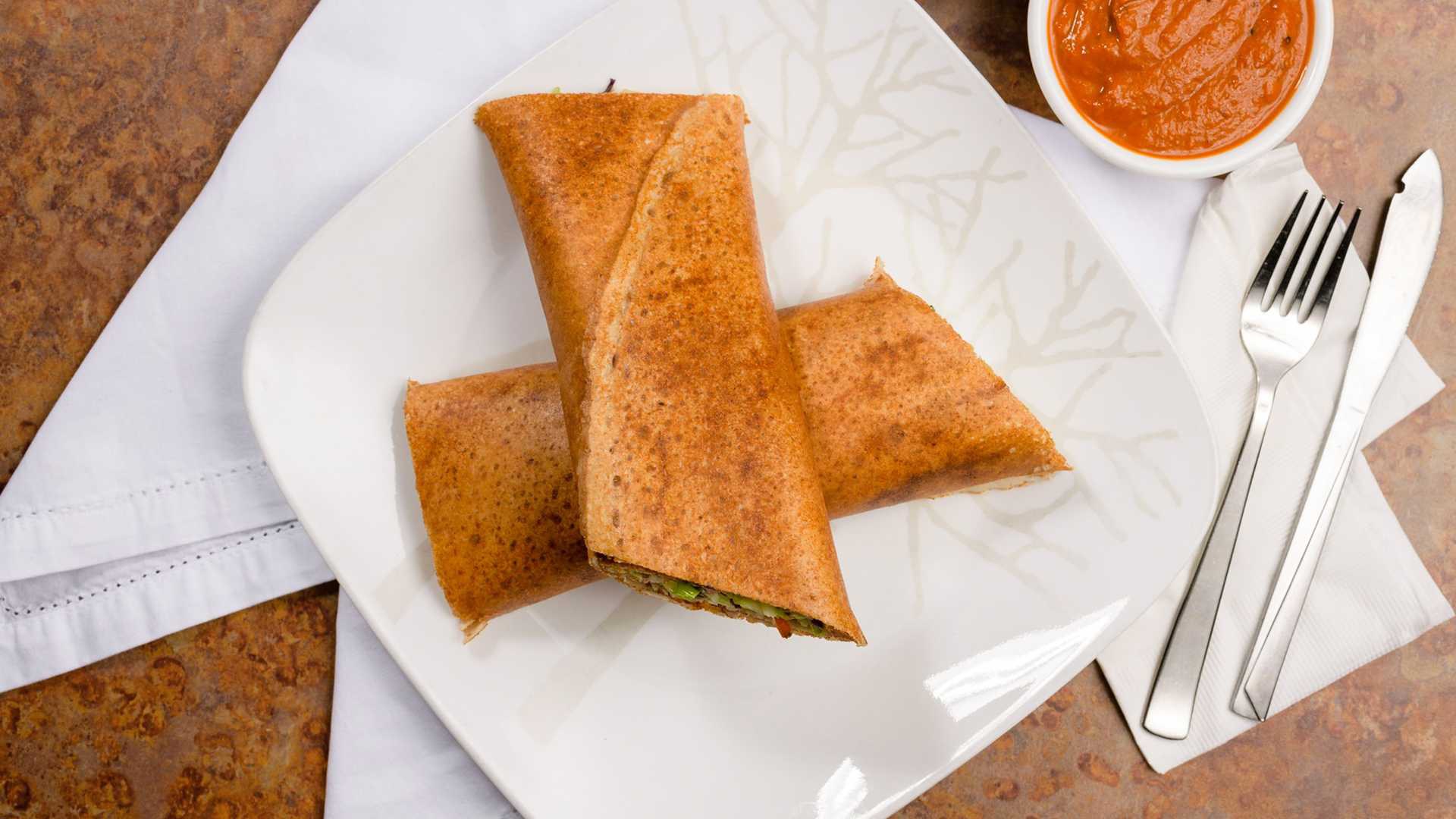 Order Rolled Dosa food online from Masala Desi Cafe store, Burlingame on bringmethat.com