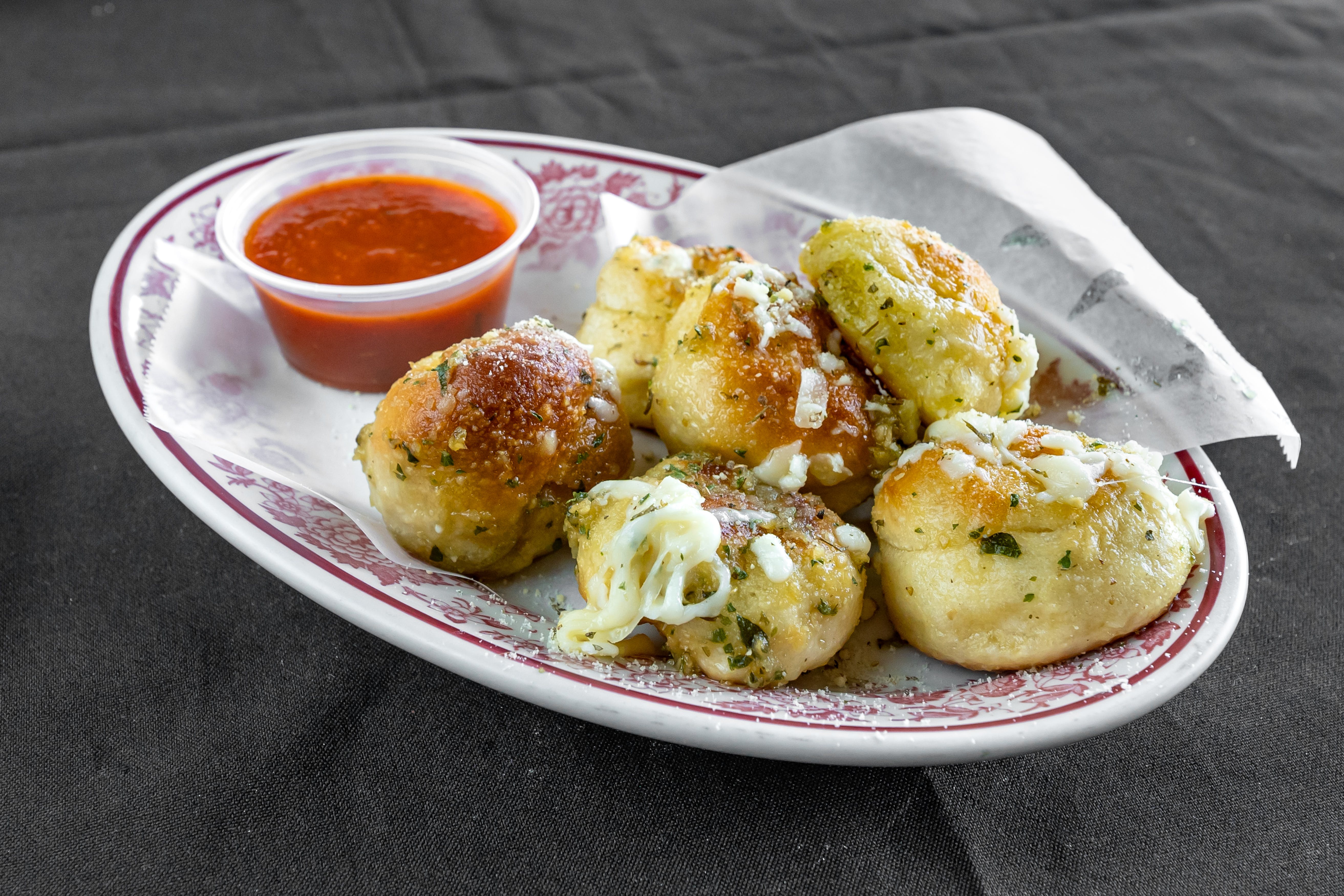 Order Garlic Knots - Small (6 Pieces) food online from Vito Pizza And Grill store, Spring City on bringmethat.com