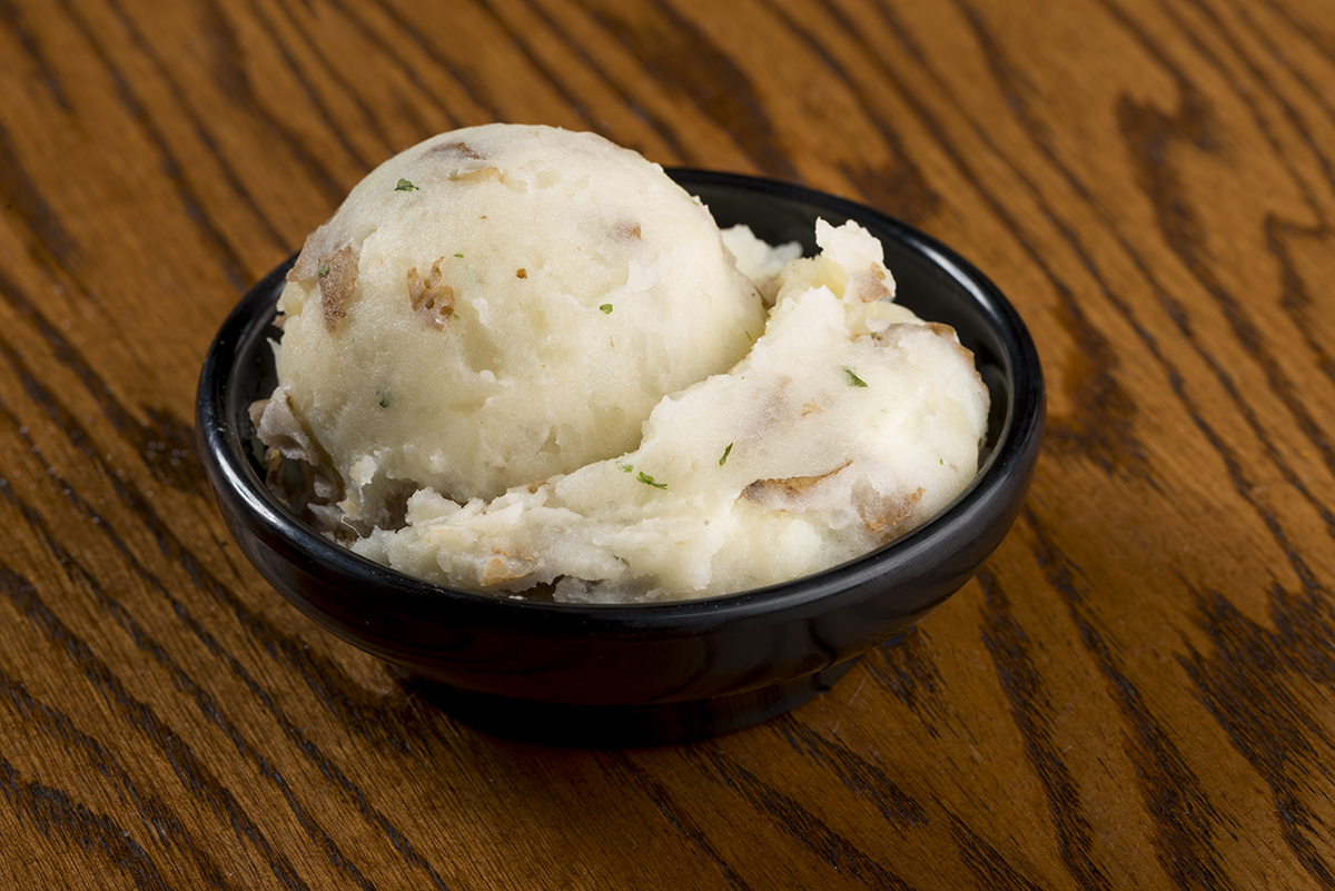 Order Skin-on Garlic Mashed Potatoes food online from Old Carolina Barbecue Company store, Canton on bringmethat.com