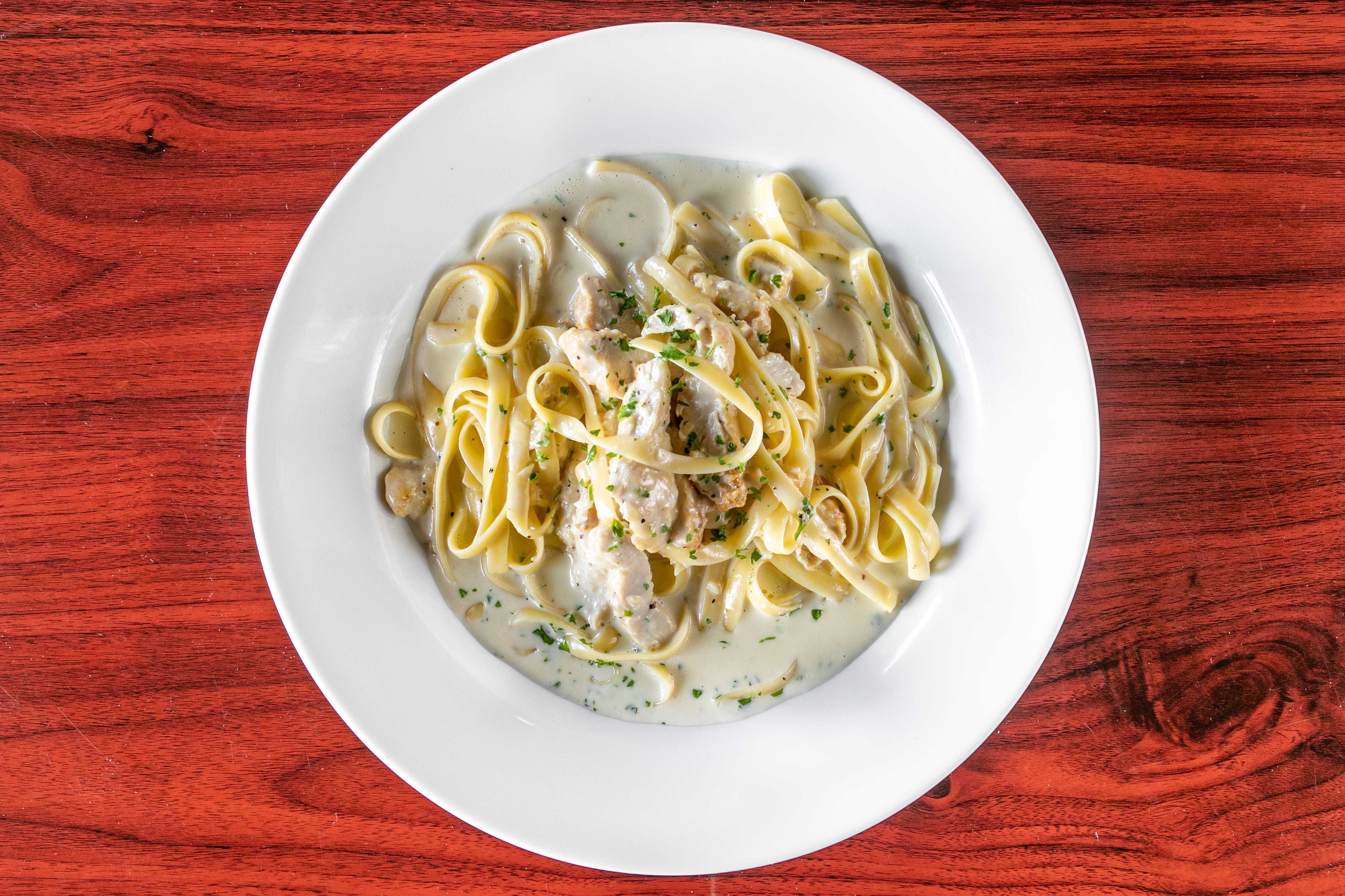 Order Chicken Fettuccine Alfredo - Entree food online from Bellissimo store, Colleyville on bringmethat.com