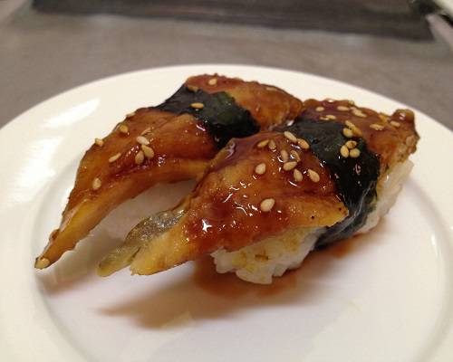 Order Eel Sushi (2pcs) food online from Sushi Factory store, Azusa on bringmethat.com