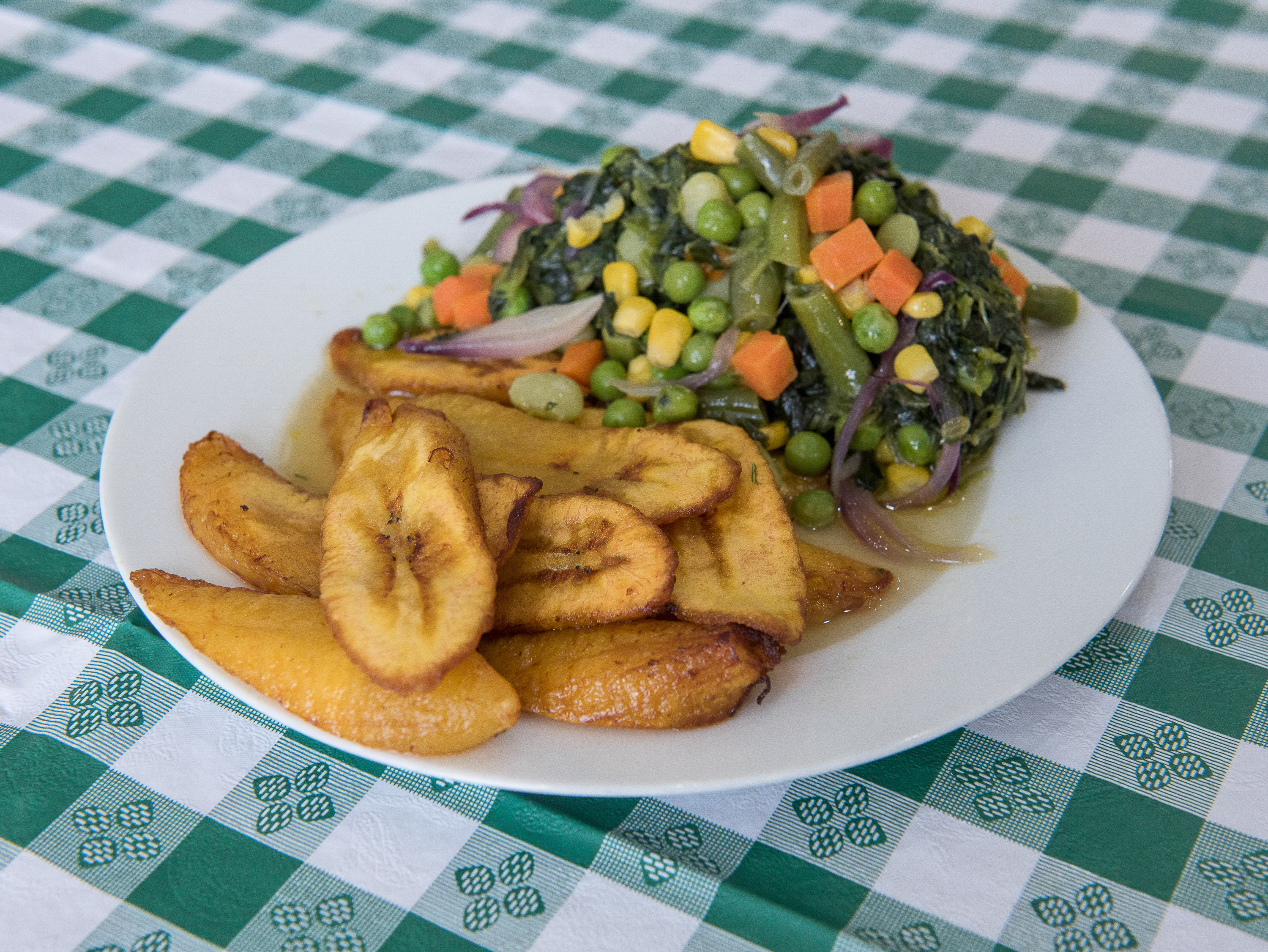 Order Mix Vegetables with Plantains food online from Pat Delicious African Restaurant store, Columbus on bringmethat.com