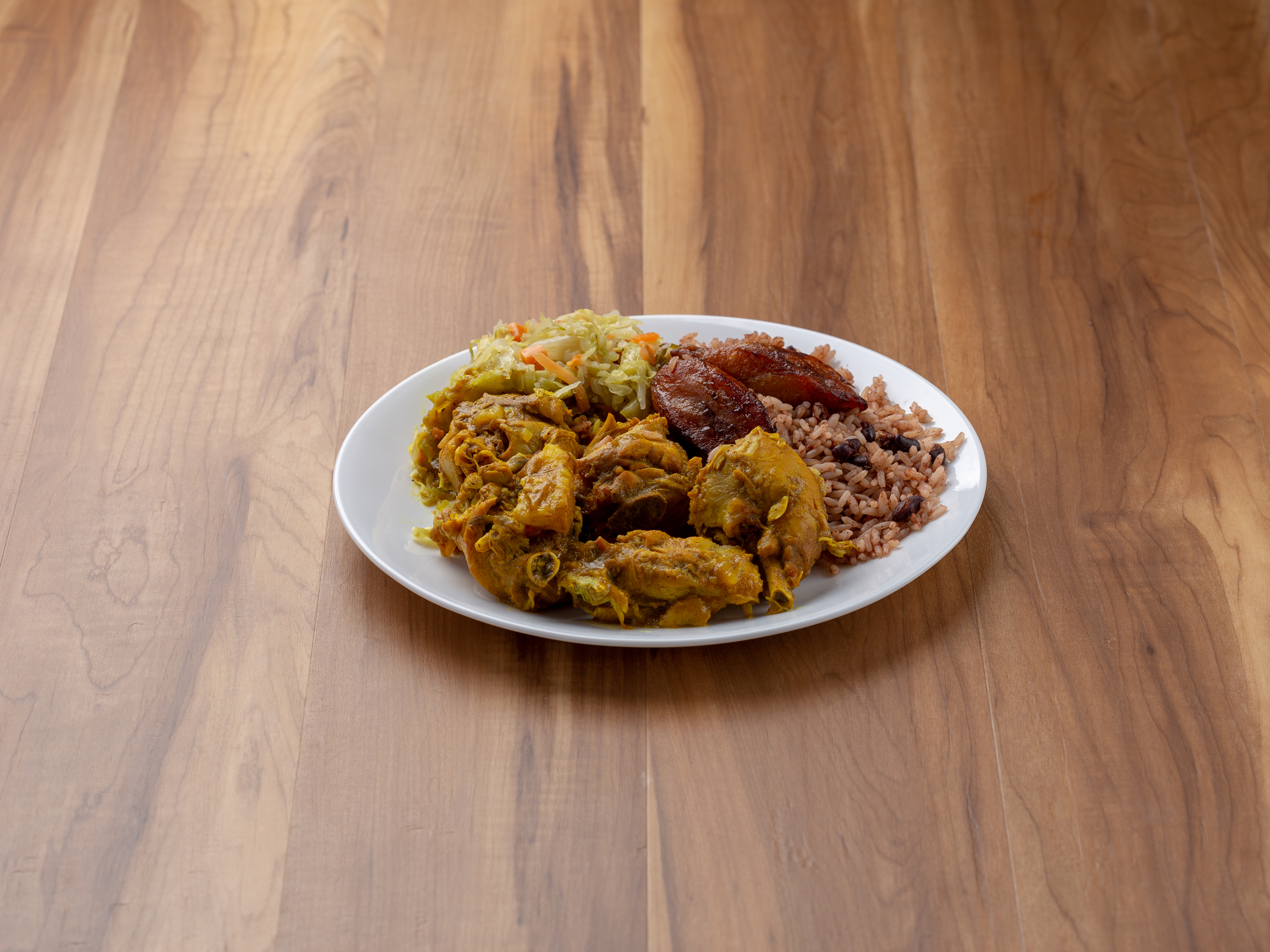 Order Curry Chicken  food online from Island Quizine store, Baltimore on bringmethat.com
