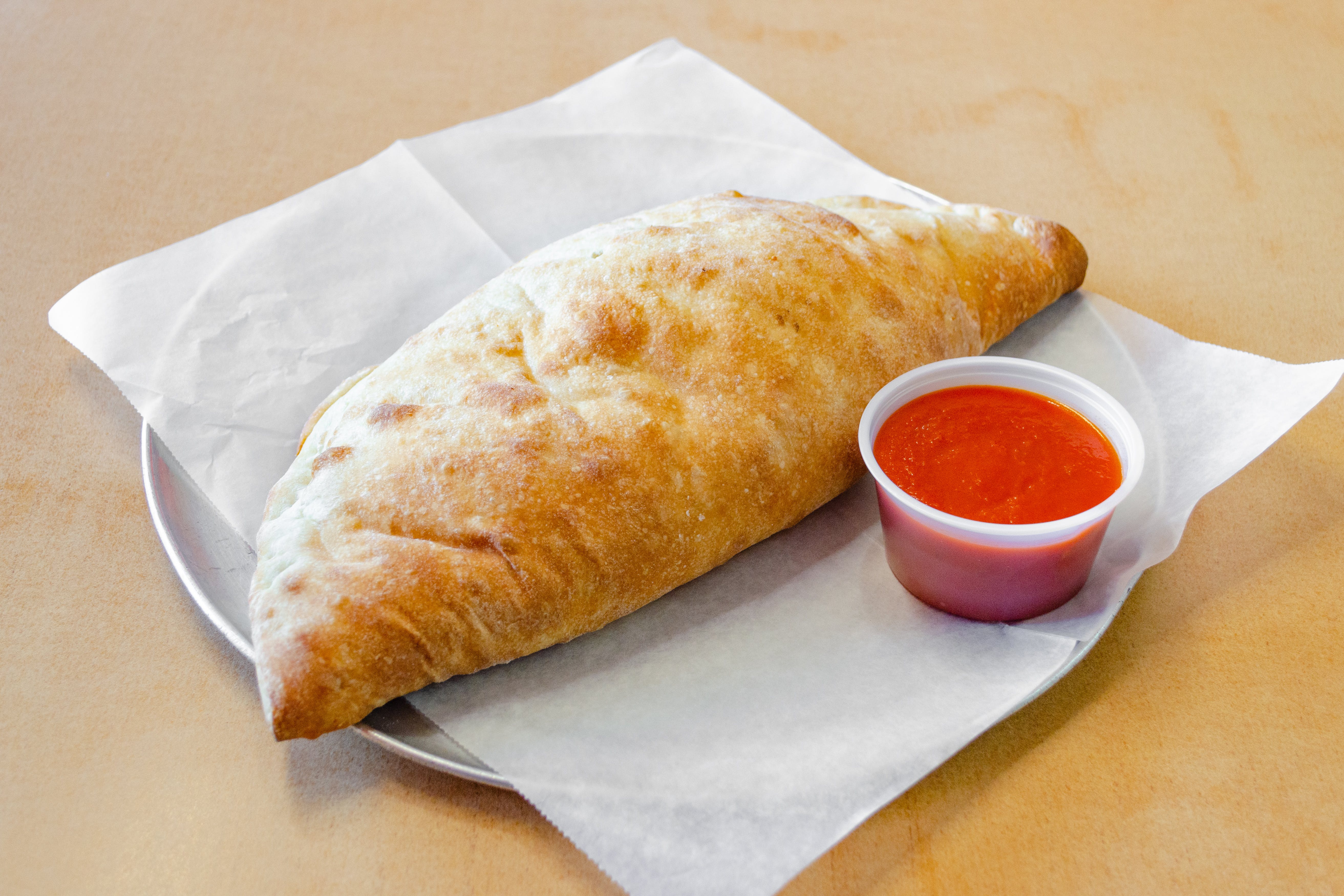 Order Pepperoni Calzone - Small food online from Ranchito Pizzeria & Mexican Restaurant store, Fords on bringmethat.com