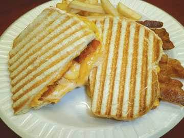 Order Grilled Bacon and Cheese Panini food online from Tharsy Grill store, Baltimore on bringmethat.com