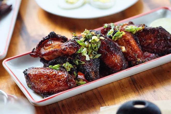 Order Garlic Black Pepper Wings food online from Founding Farmers store, Providence on bringmethat.com