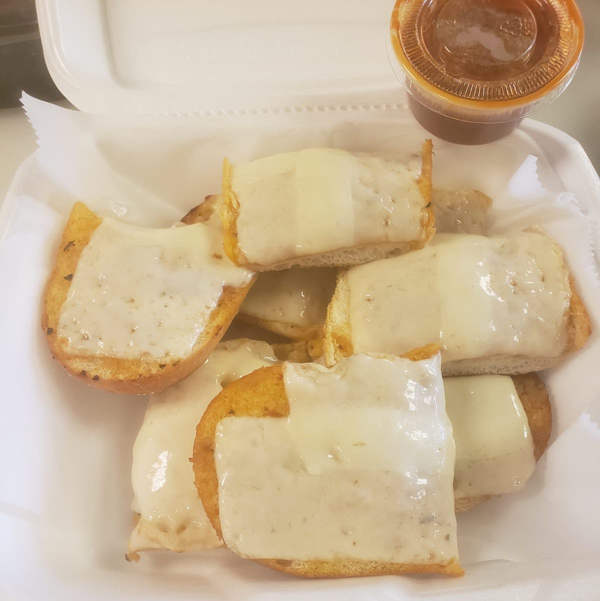 Order Garlic Bread with Cheese - Appetizer food online from Drake Pizza store, Allentown on bringmethat.com