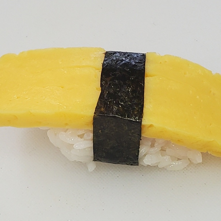 Order Egg Sushi (3pcs) food online from Sushi Loco store, Long Beach on bringmethat.com