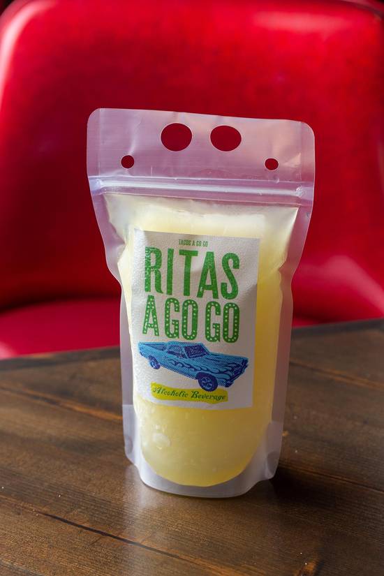 Order Frozen Margarita-  (contains Alcohol) food online from Fajitas A Go Go store, Houston on bringmethat.com