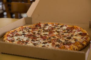 Order Meat Lovers Pizza food online from Massino's Pizzeria store, Aurora on bringmethat.com