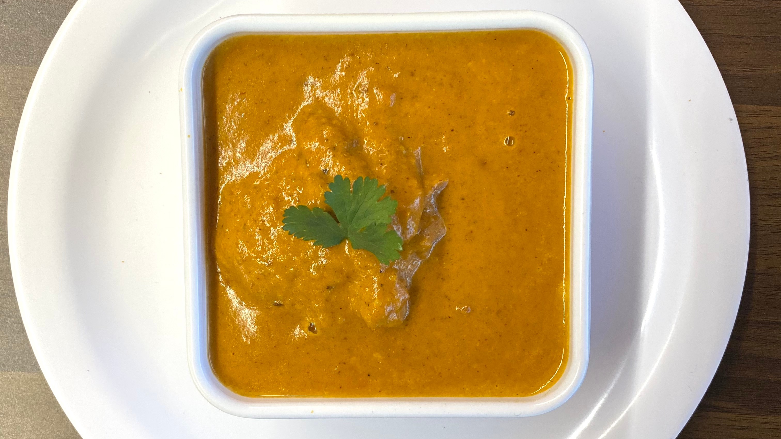 Order Chicken Korma food online from Indian Cafe store, East Moline on bringmethat.com