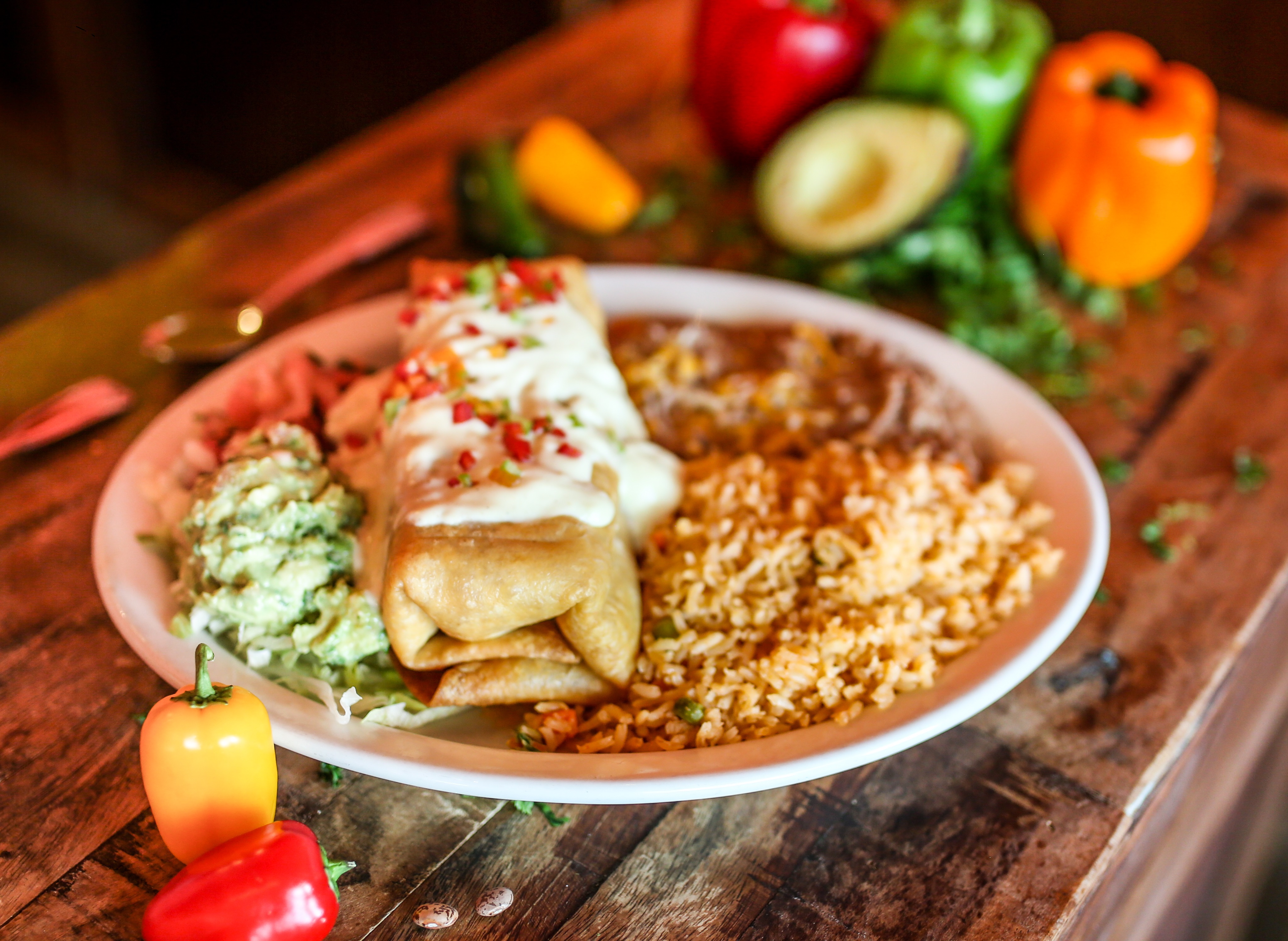 Order Chimichanga Mazatlan food online from Miguels Mexican Bar And Grill store, Colorado Springs on bringmethat.com