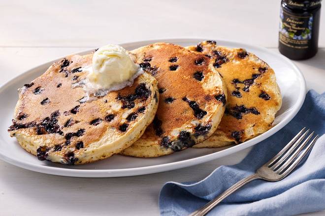 Order Wild Maine Blueberry Pancakes – Three food online from Cracker Barrel store, DeSoto on bringmethat.com