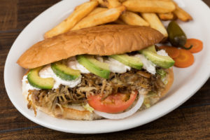 Order Sandwich de Carnitas food online from Tostada Regia store, Houston on bringmethat.com