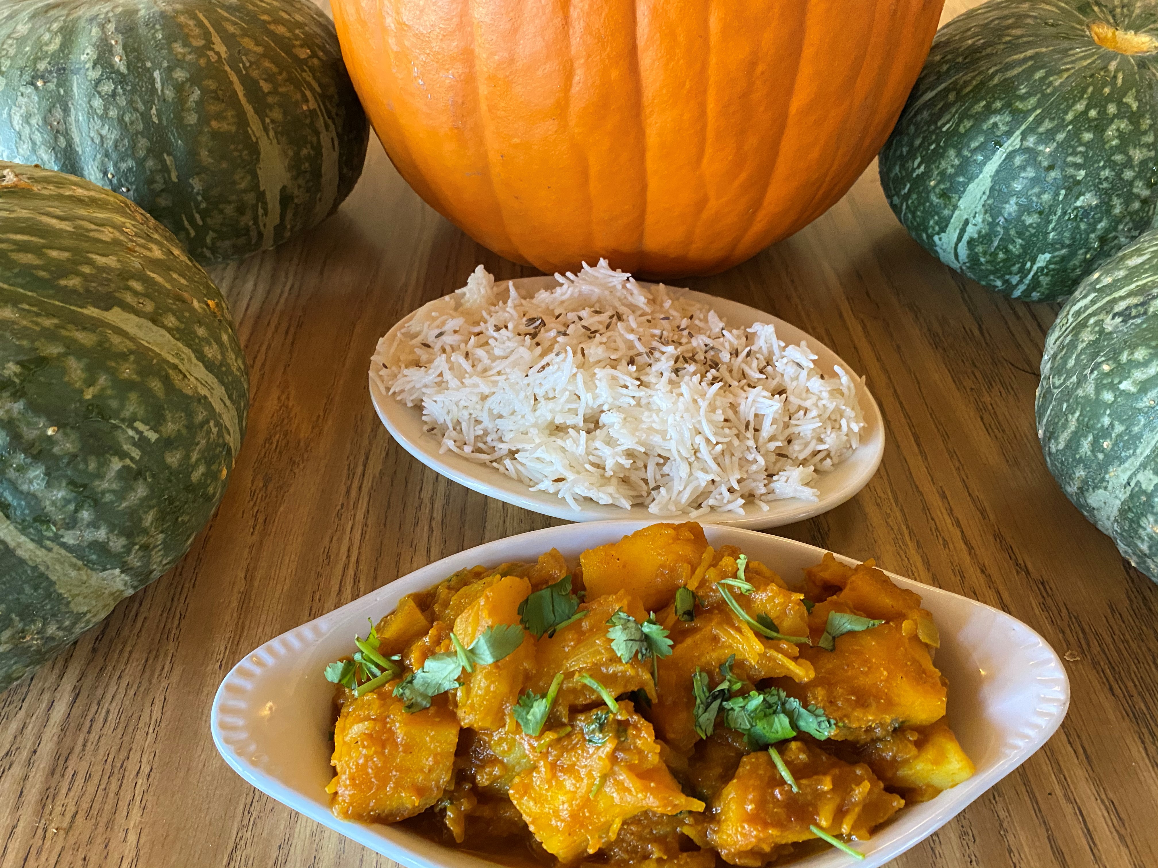 Order Pumpkin Curry, Vegan or Add Meat food online from Cafe Raj store, Albany on bringmethat.com