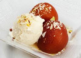 Order 2 Piece Gulab Jamun with Ice Cream food online from Gourmet India store, Houston on bringmethat.com