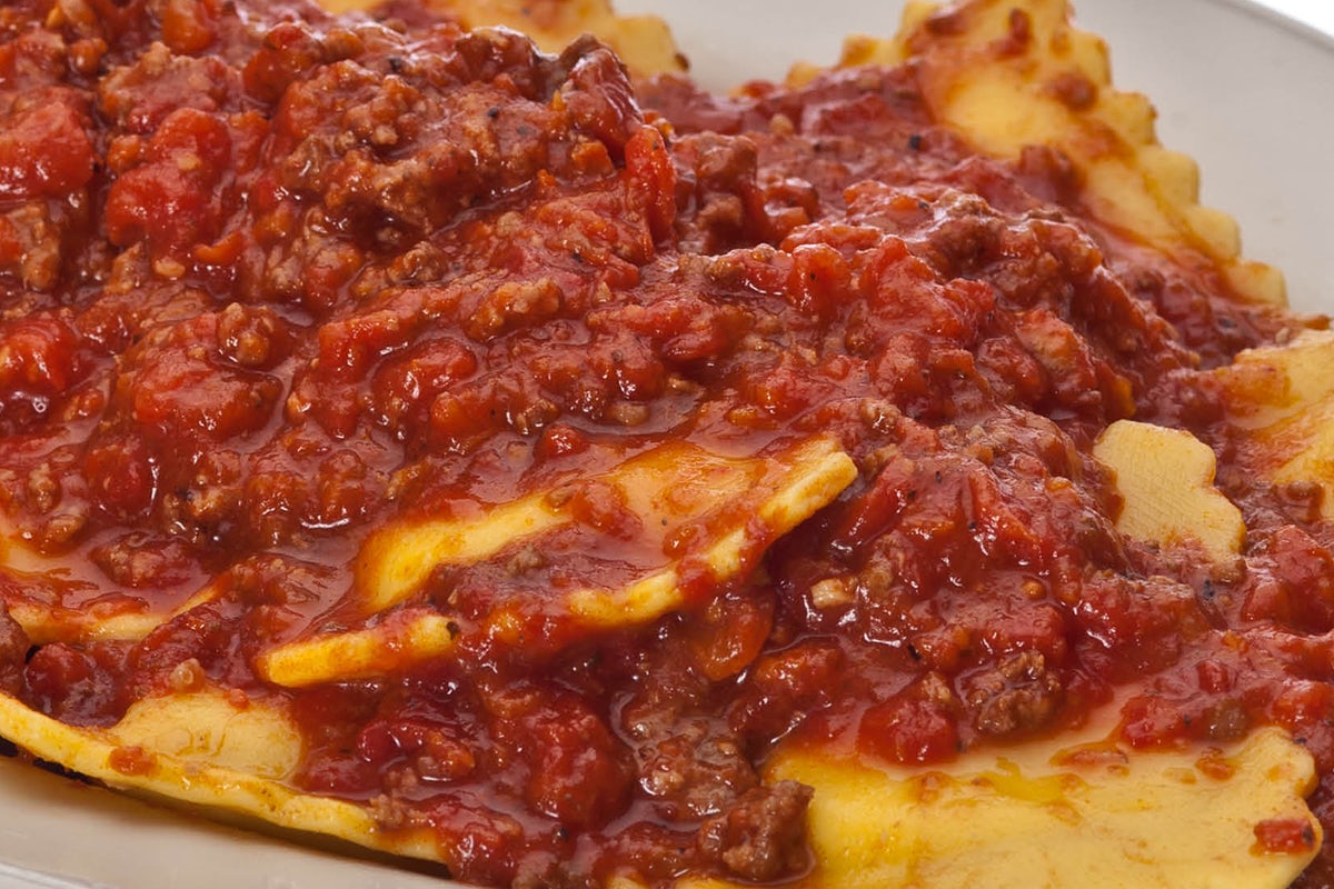 Order Ravioli with Meat Sauce food online from Buca di Beppo store, Columbus on bringmethat.com