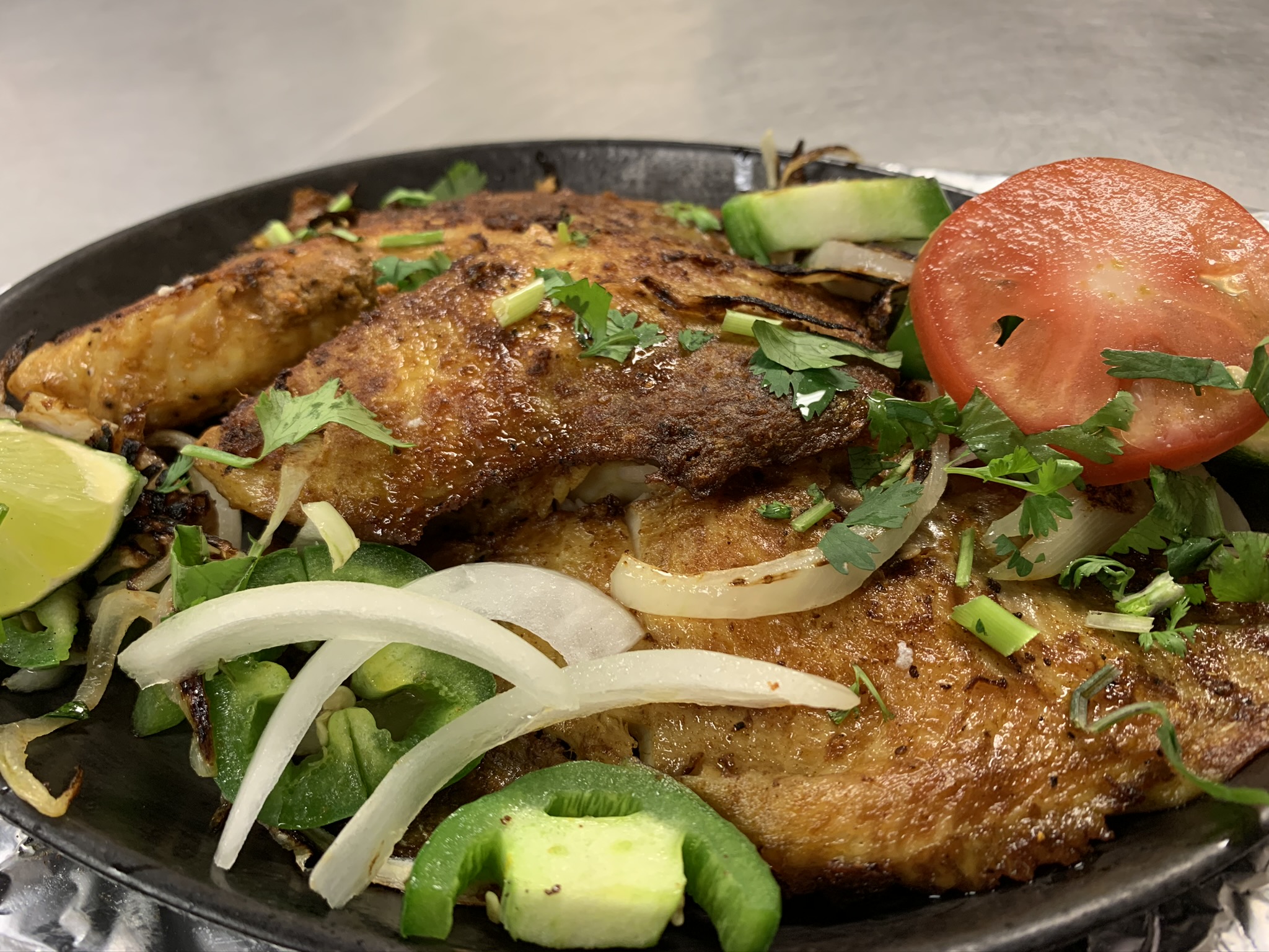 Order (GR) Grilled Tilapia food online from Rice n roti store, Plano on bringmethat.com