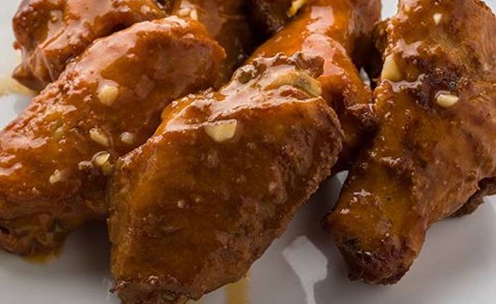 Order Jamaican Jerk Wings food online from Pepperoni's store, Fort Bend County on bringmethat.com