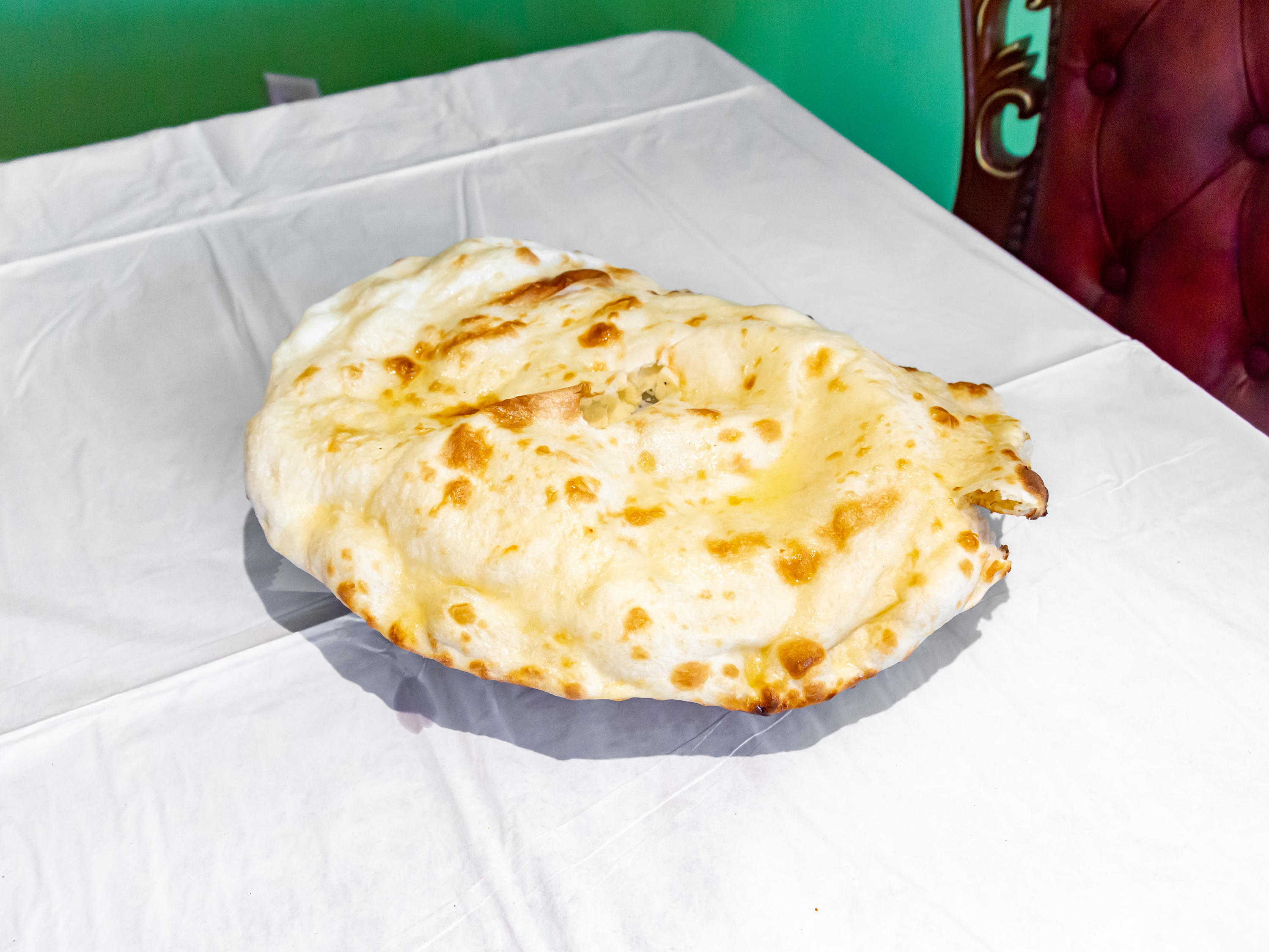 Order Naan food online from Indian Delight store, Catonsville on bringmethat.com